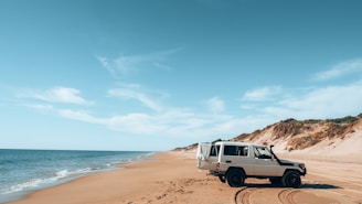 a van parked on a beach