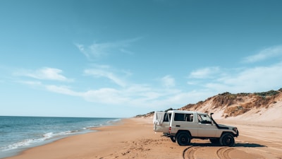 a van parked on a beach