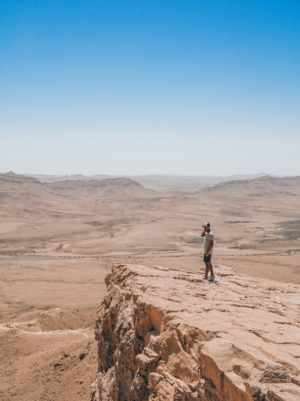 a man standing on a rock