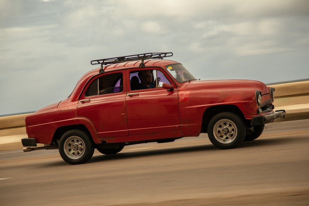 a red car on a road