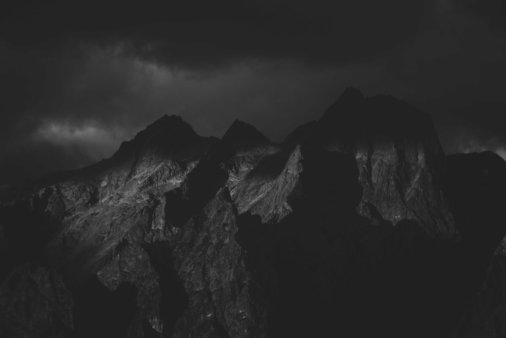 a mountain with a dark sky