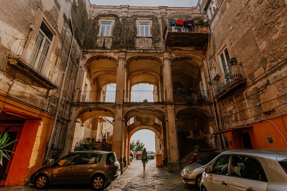 a street with cars and buildings