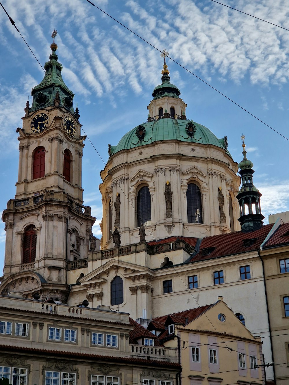 a large building towers over a city