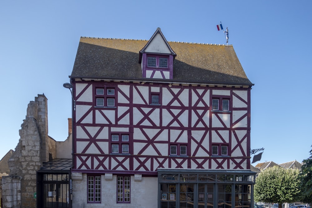 a building with a red and white exterior