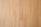 Smooth, light wooden surface with subtle grain patterns. The texture appears polished and seamless, suggesting laminate or hardwood flooring.