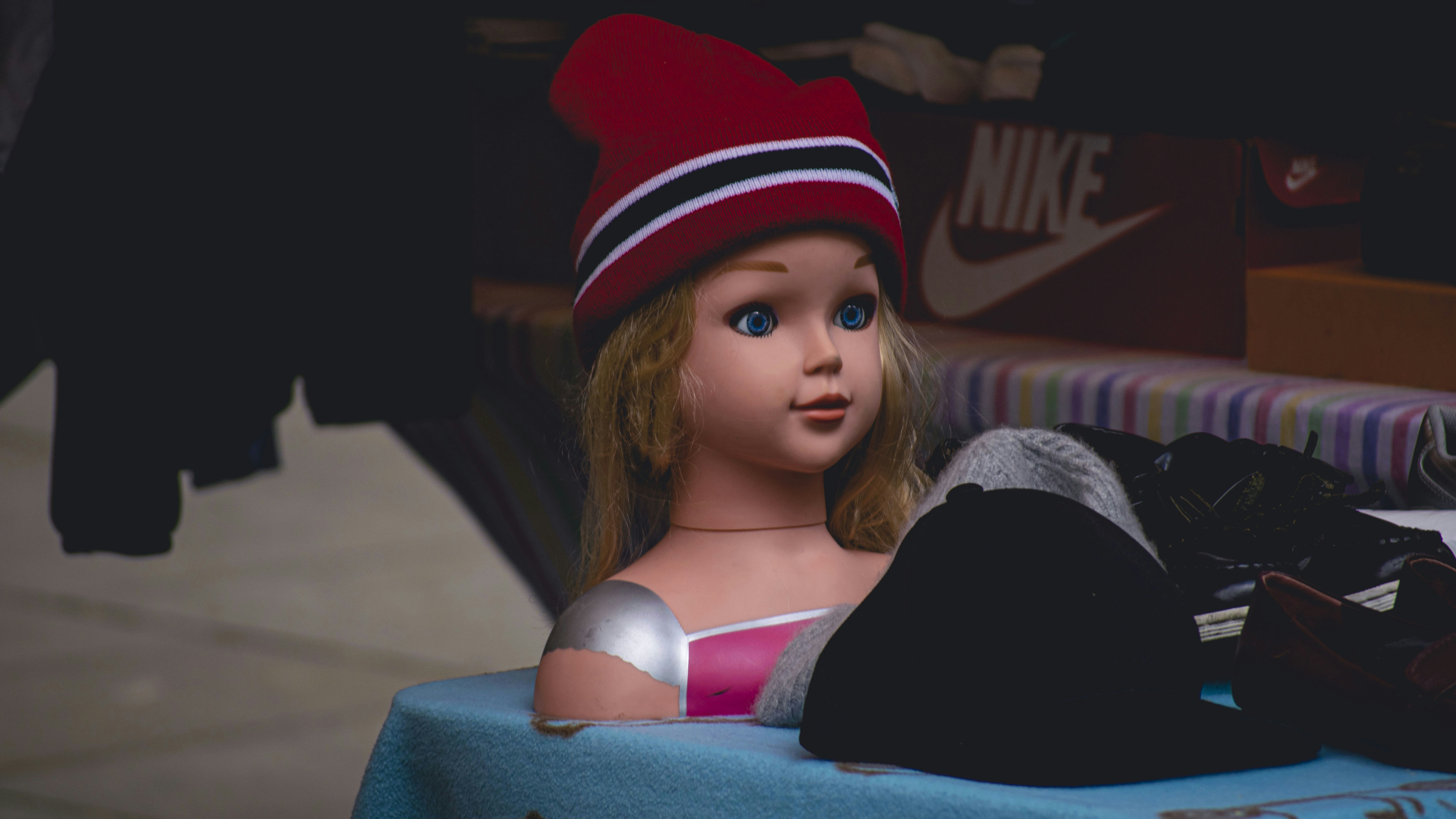 a doll wearing a hat
