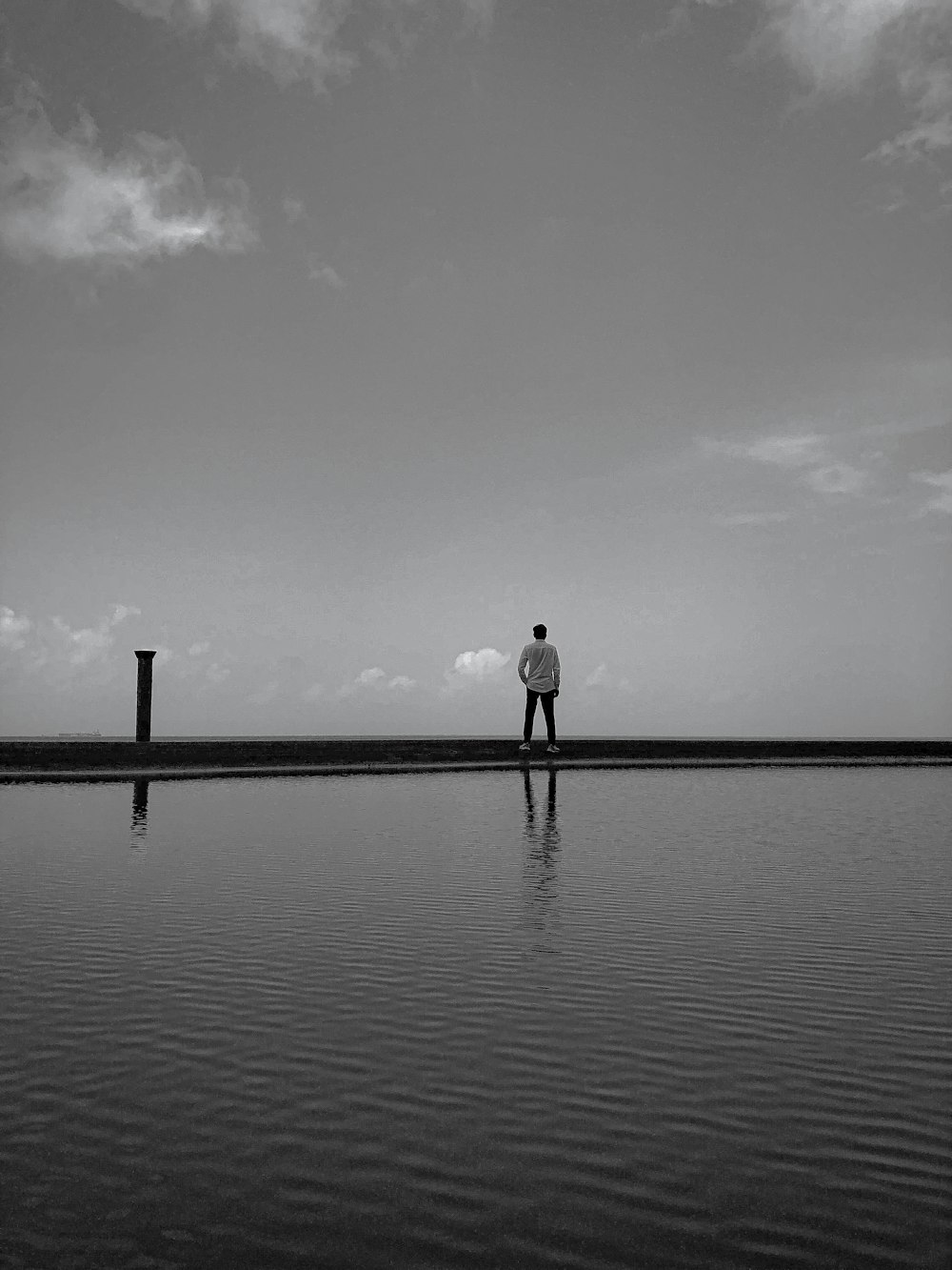 a person standing on a dock