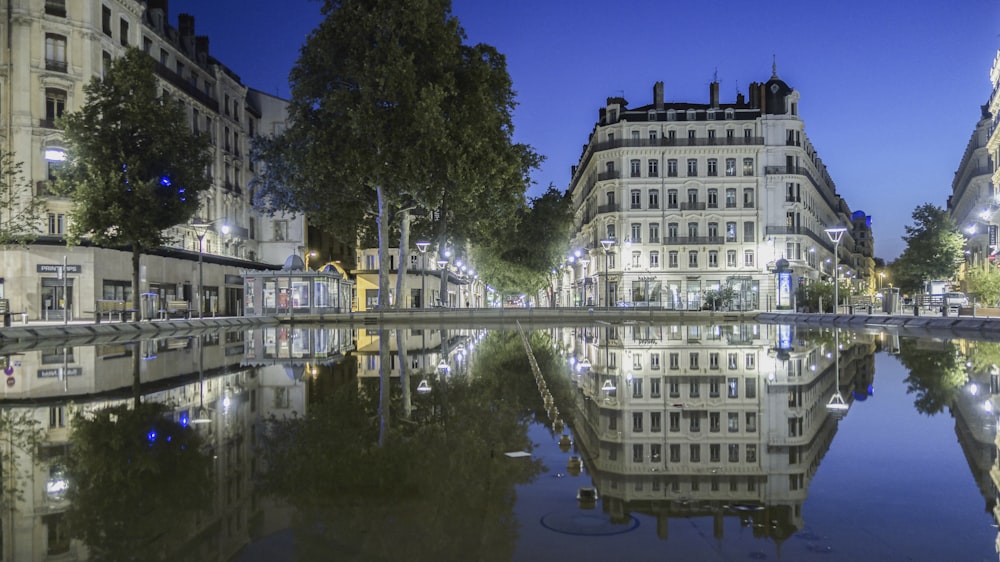 a body of water with buildings around it