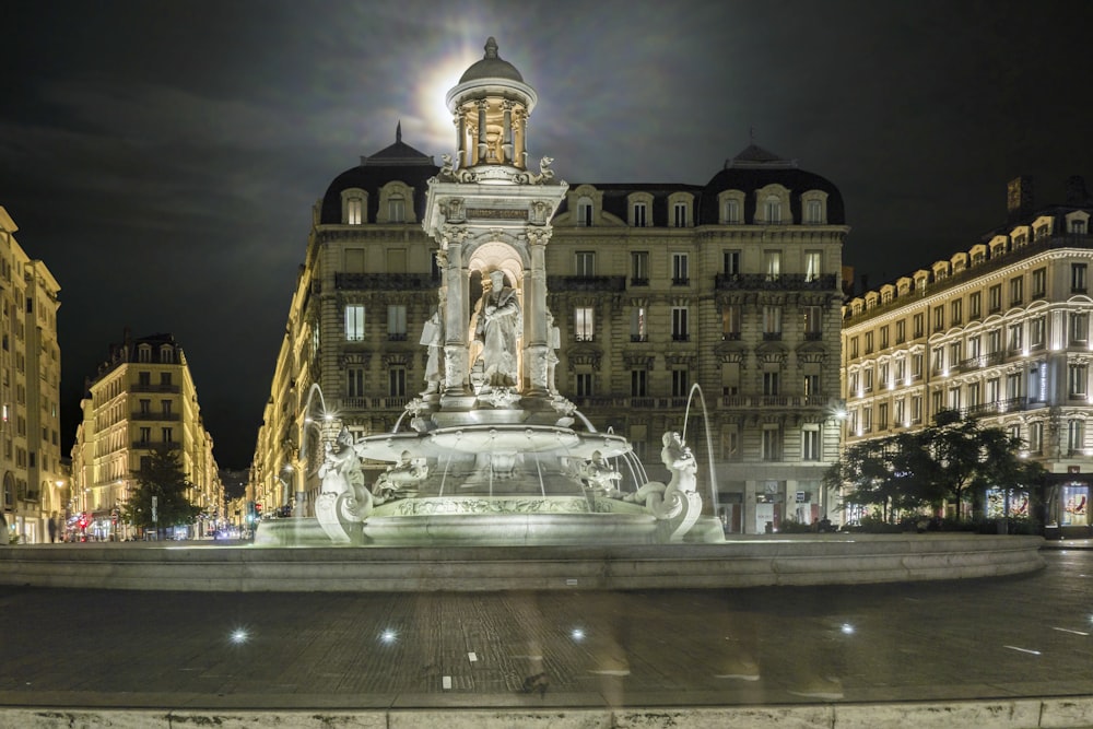 a fountain in front of a building