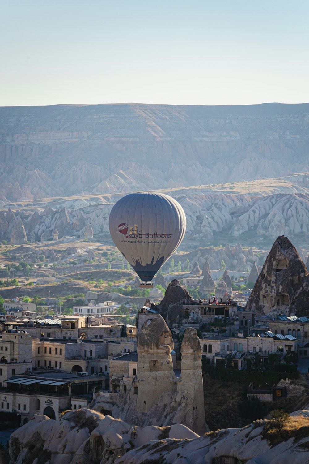a hot air balloon over a city