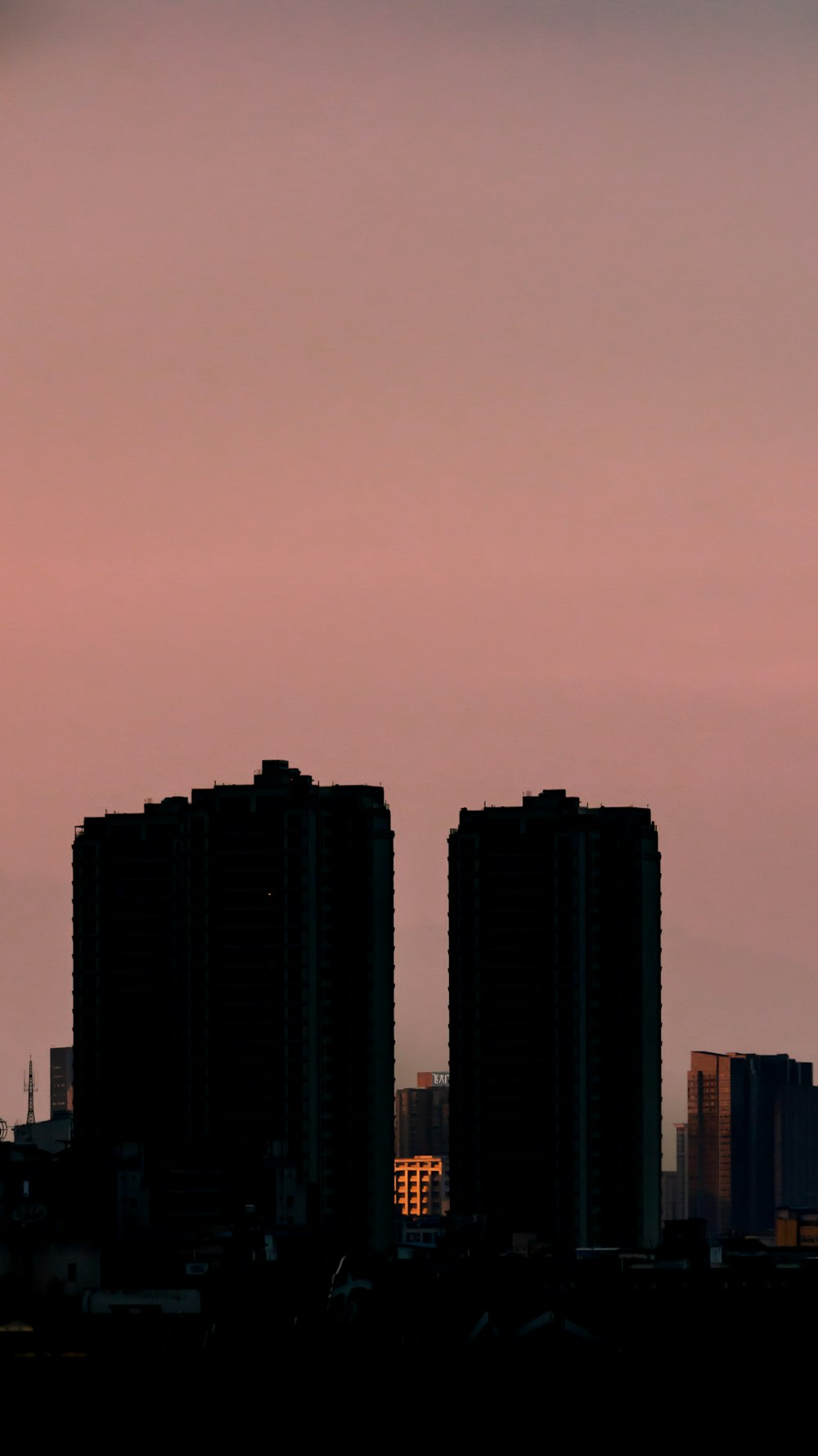 a city skyline at sunset