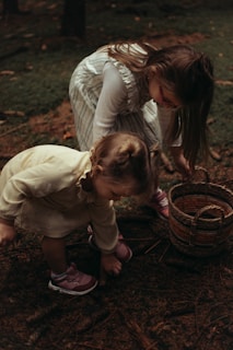 Young explorers wearing handmade animal-skin costumes, playing in a wooded area