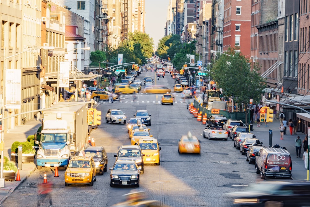 a busy street with cars and trucks