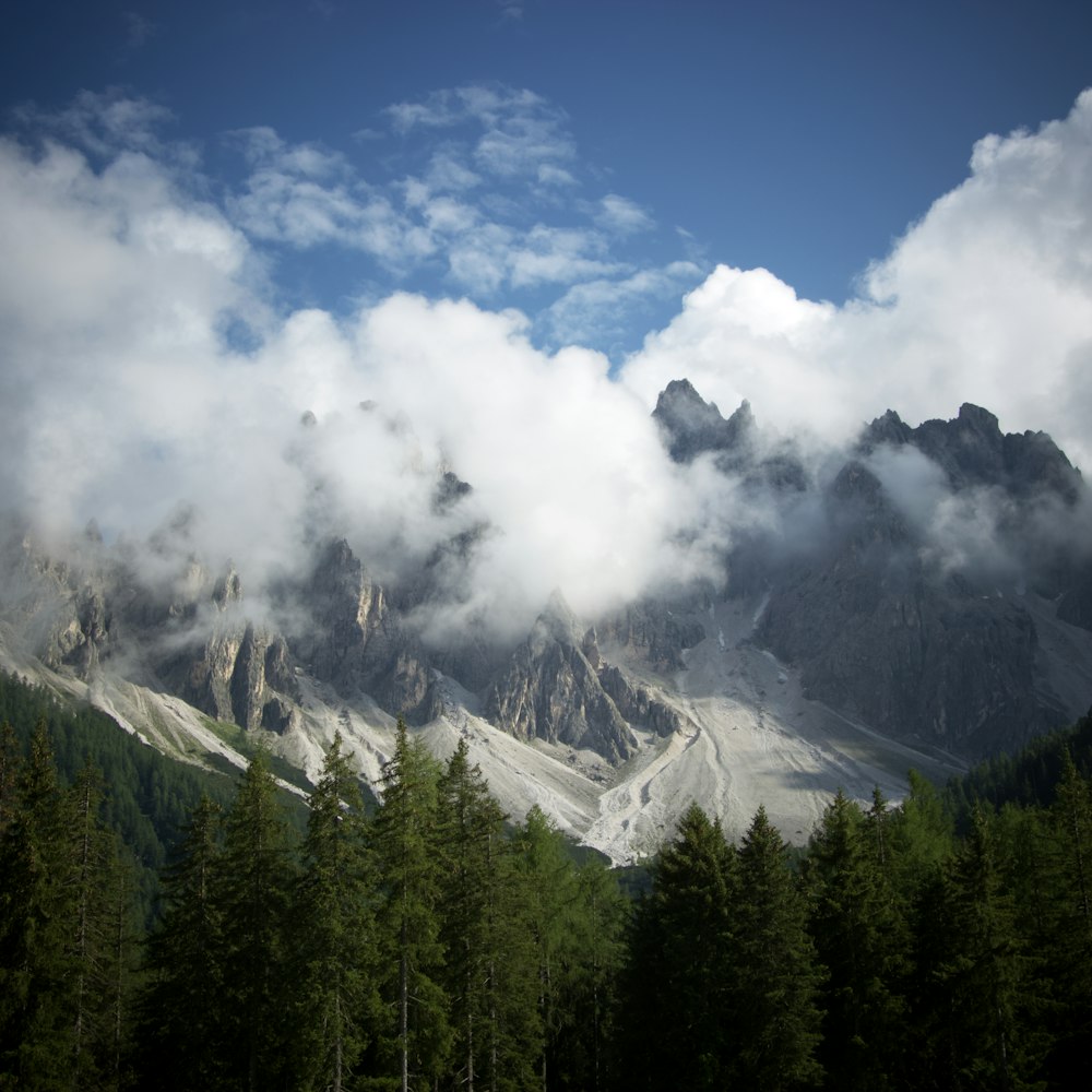 a mountain with clouds