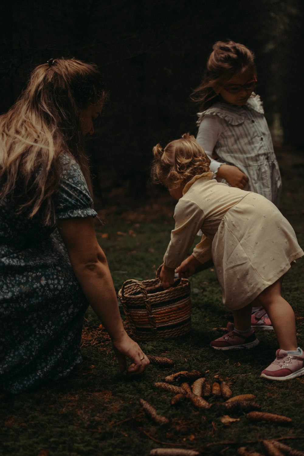 a person and a child holding a basket