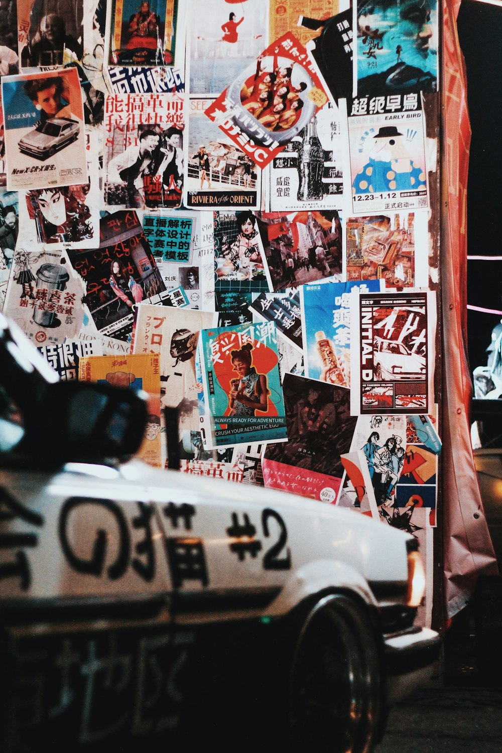 a wall covered in posters