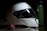 Close-up of a sleek Timora watch resting on a racing helmet.