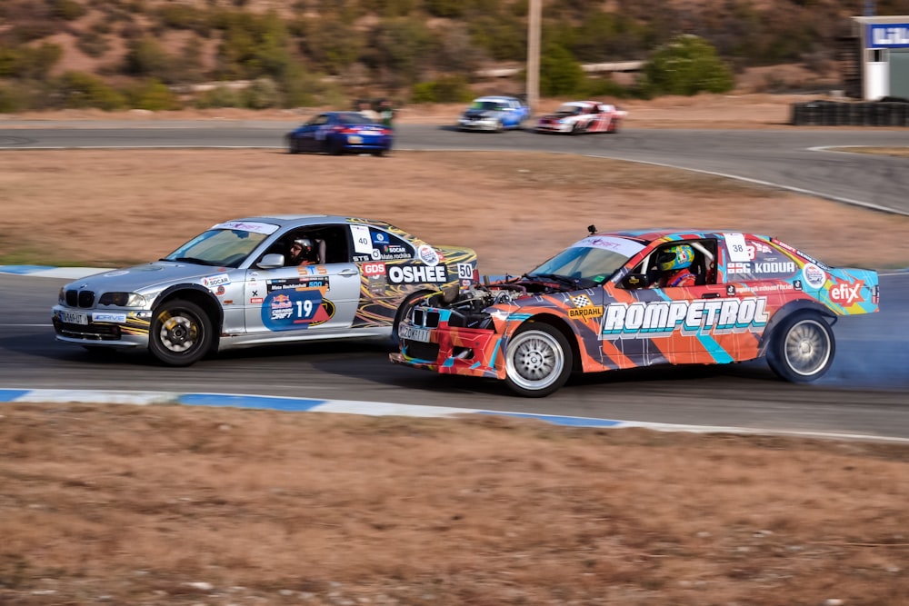 a group of race cars on a track