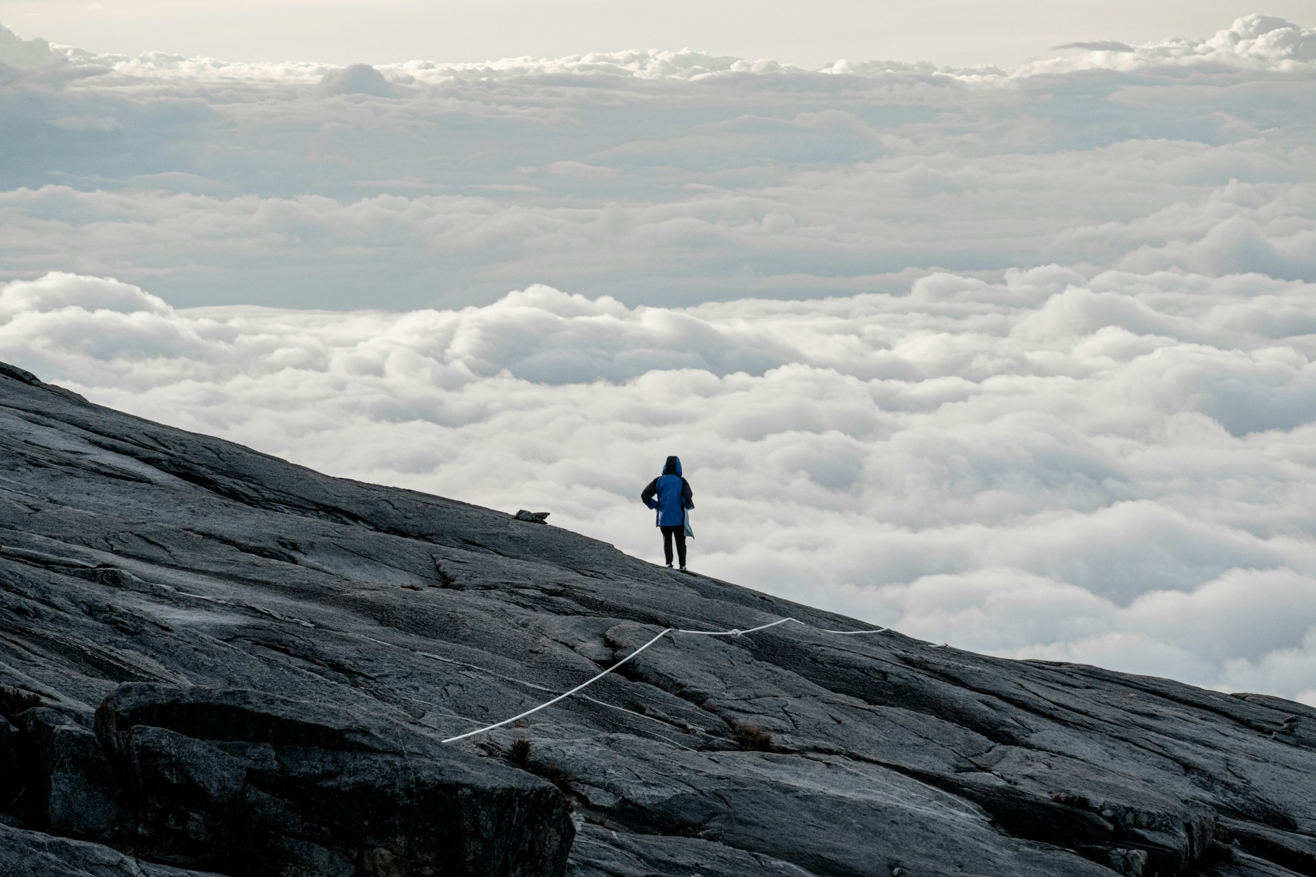 a person standing on a mountain
