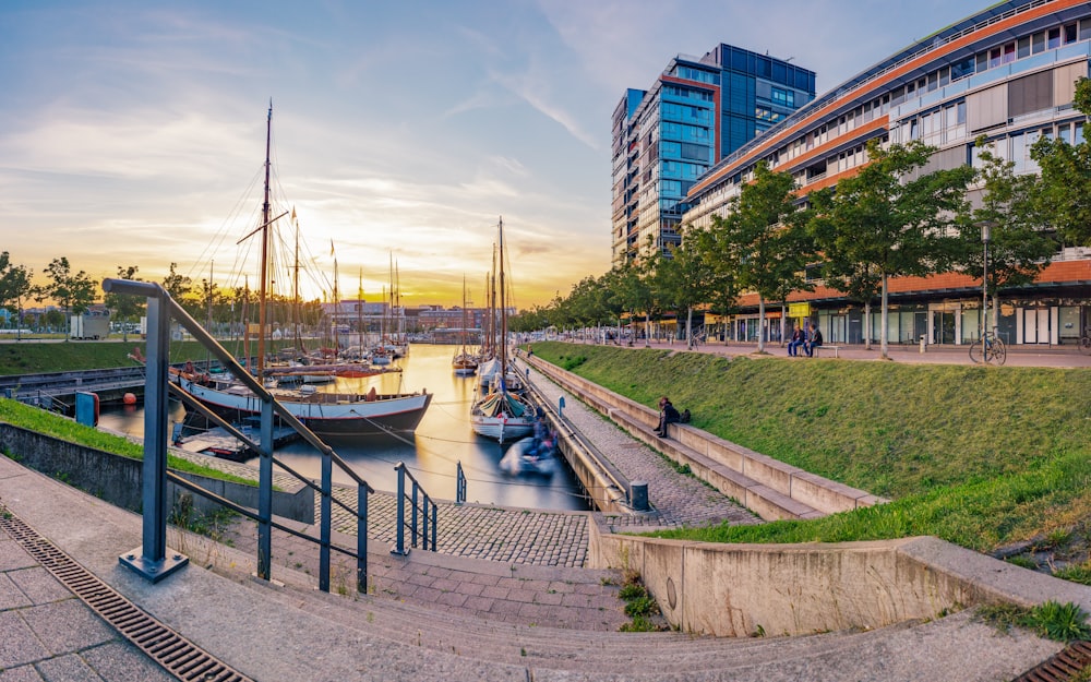 a body of water with boats in it and buildings around it