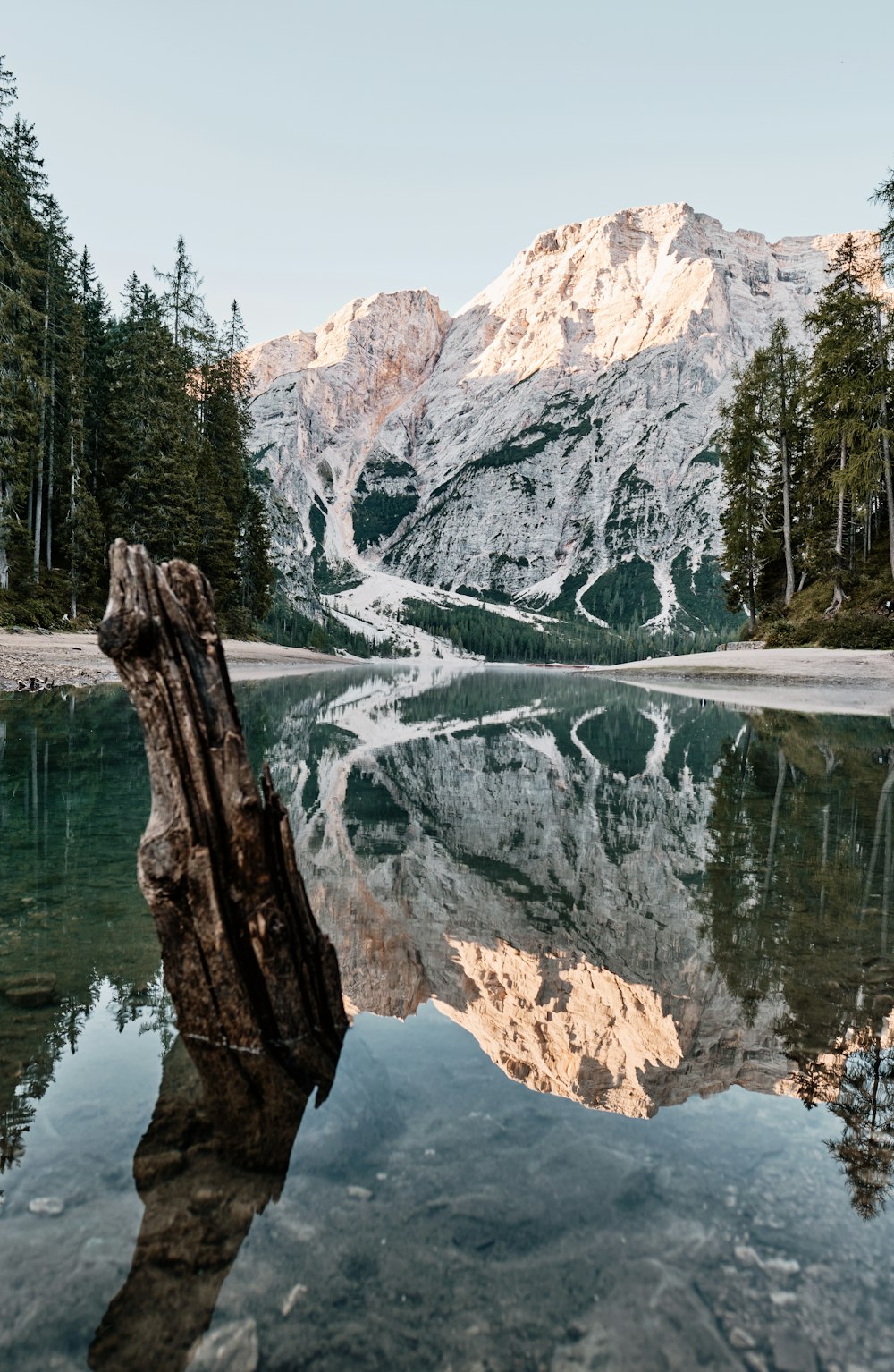 a lake with a mountain in the background