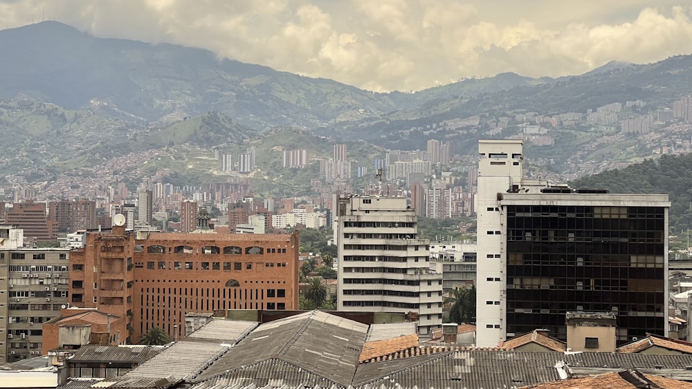 a city with mountains in the background