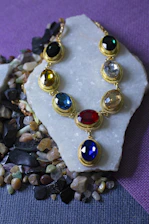 a necklace with many stones