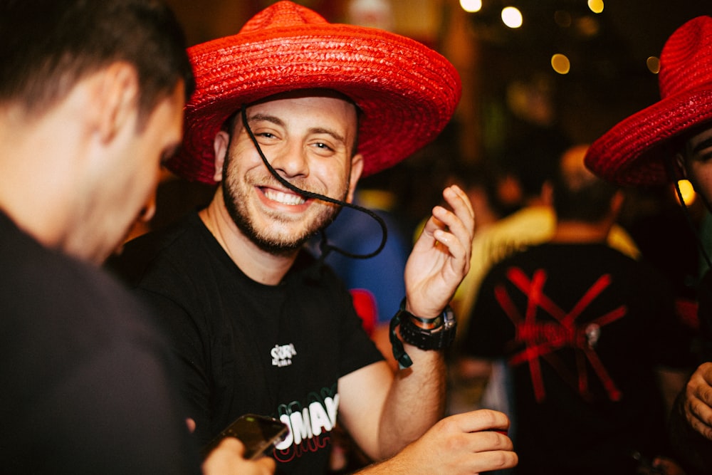 a man wearing a red hat