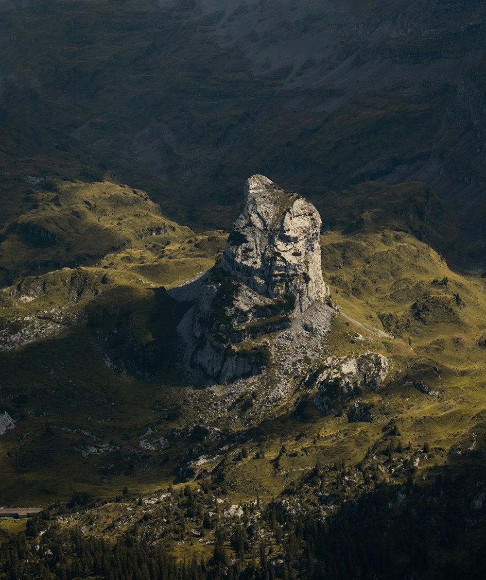 a mountain with a large rock formation