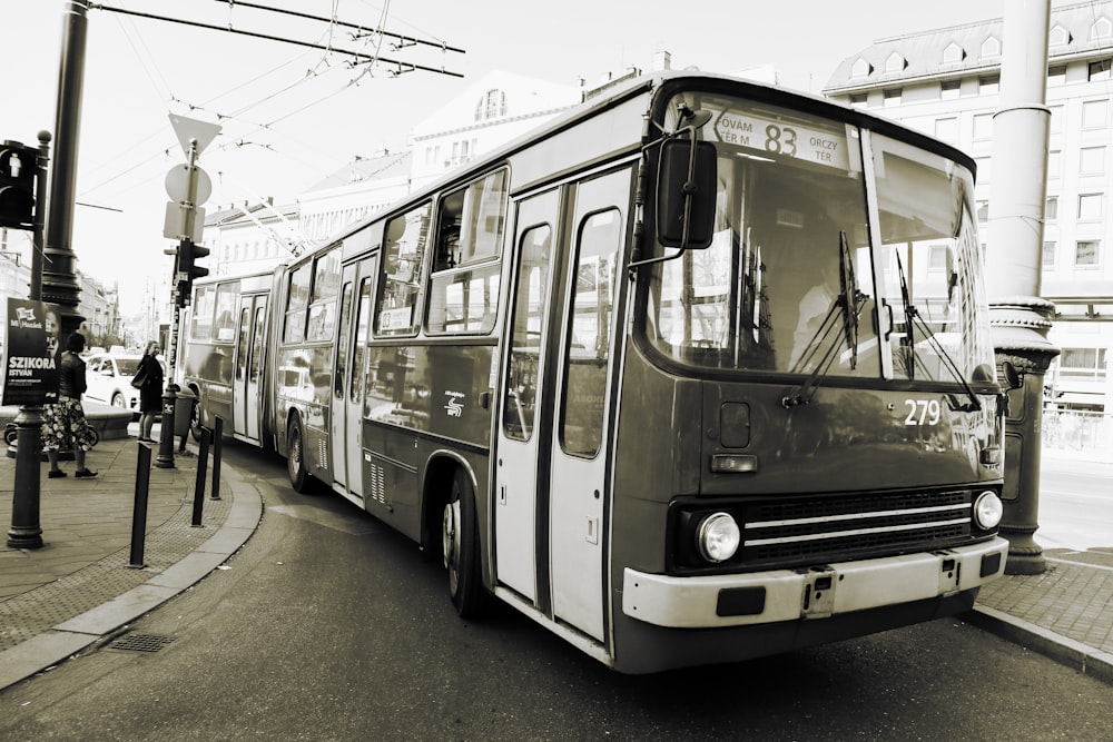 a bus travels down the street