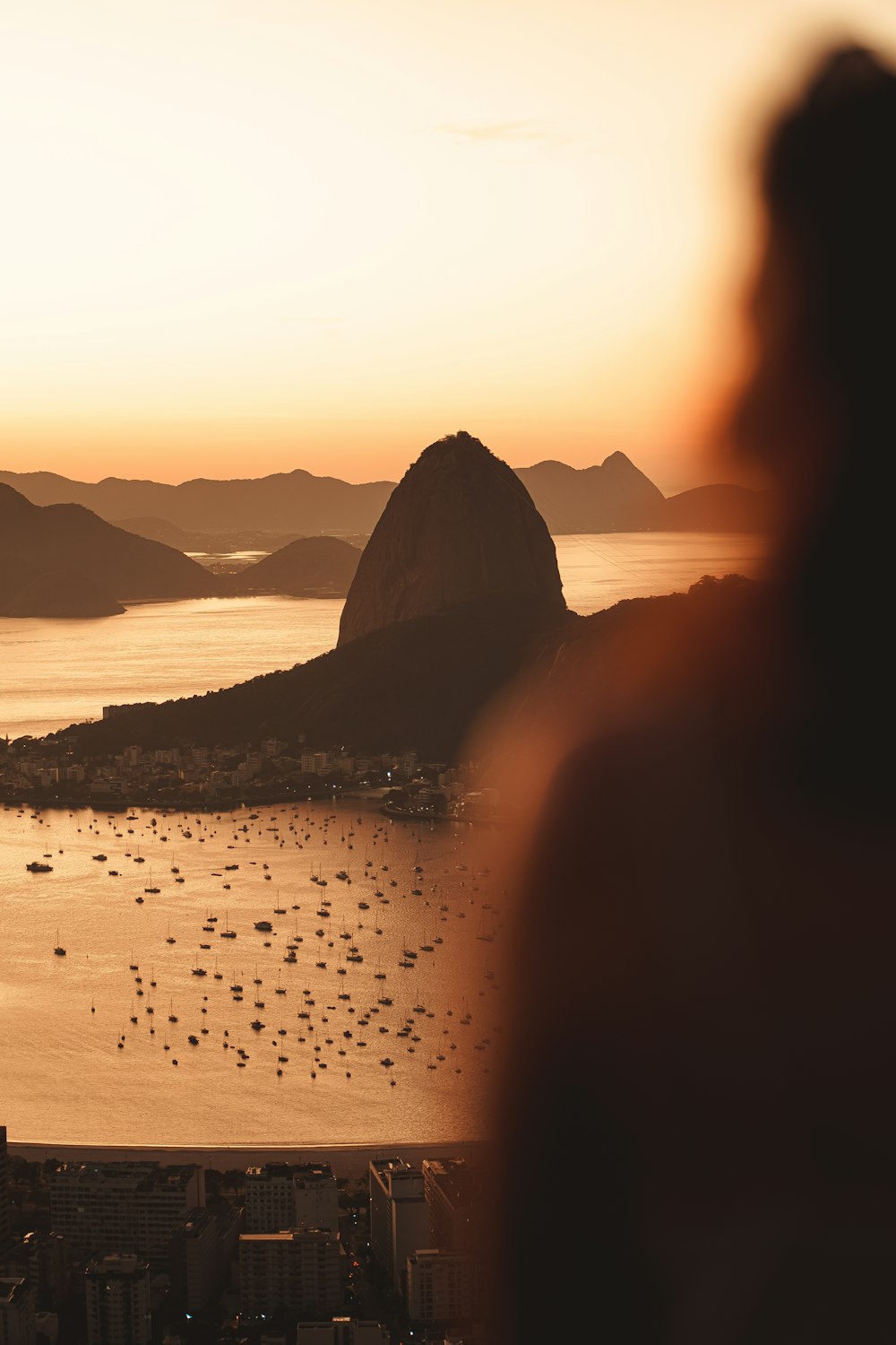 a person looking out at a city