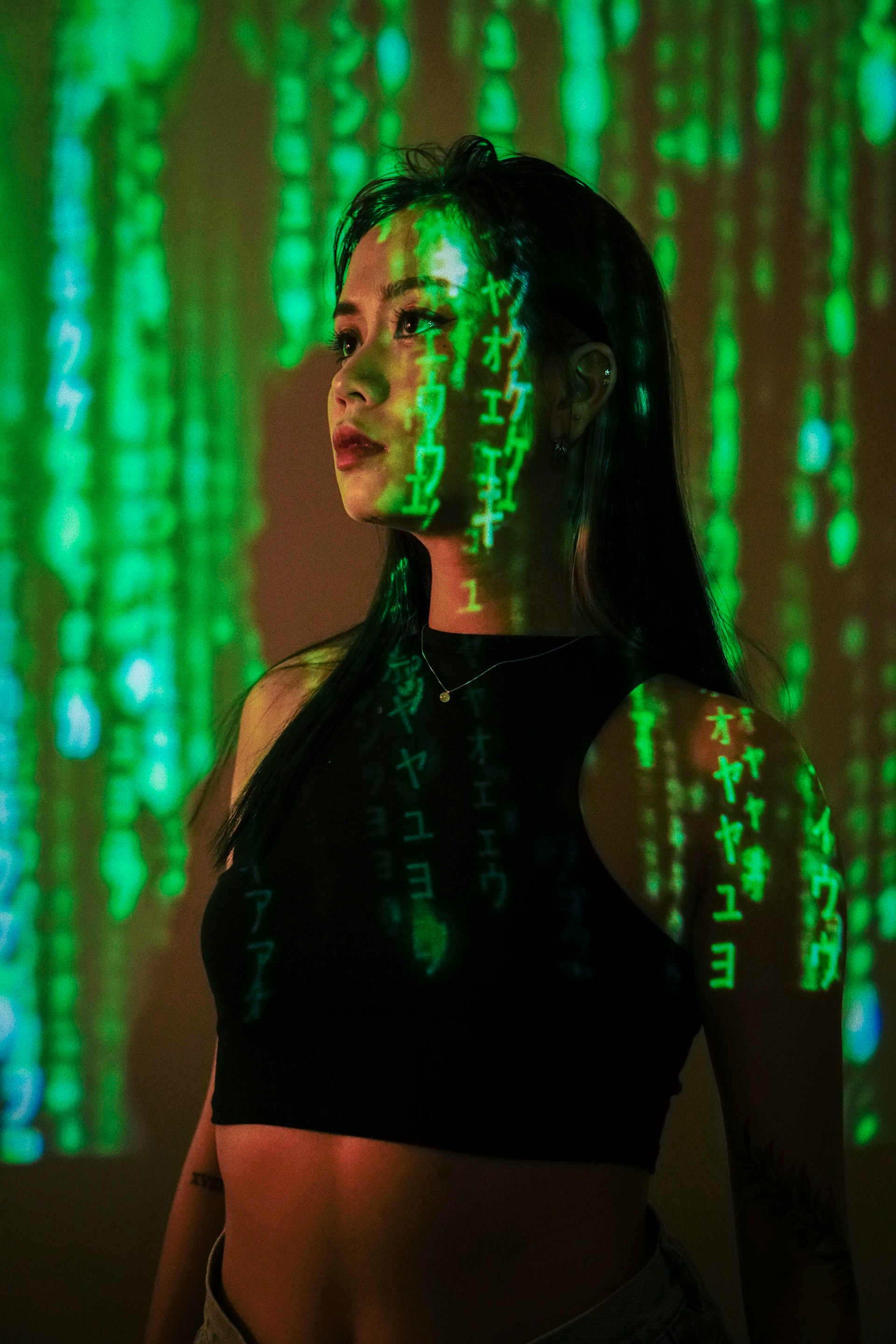 a woman with green paint on her face