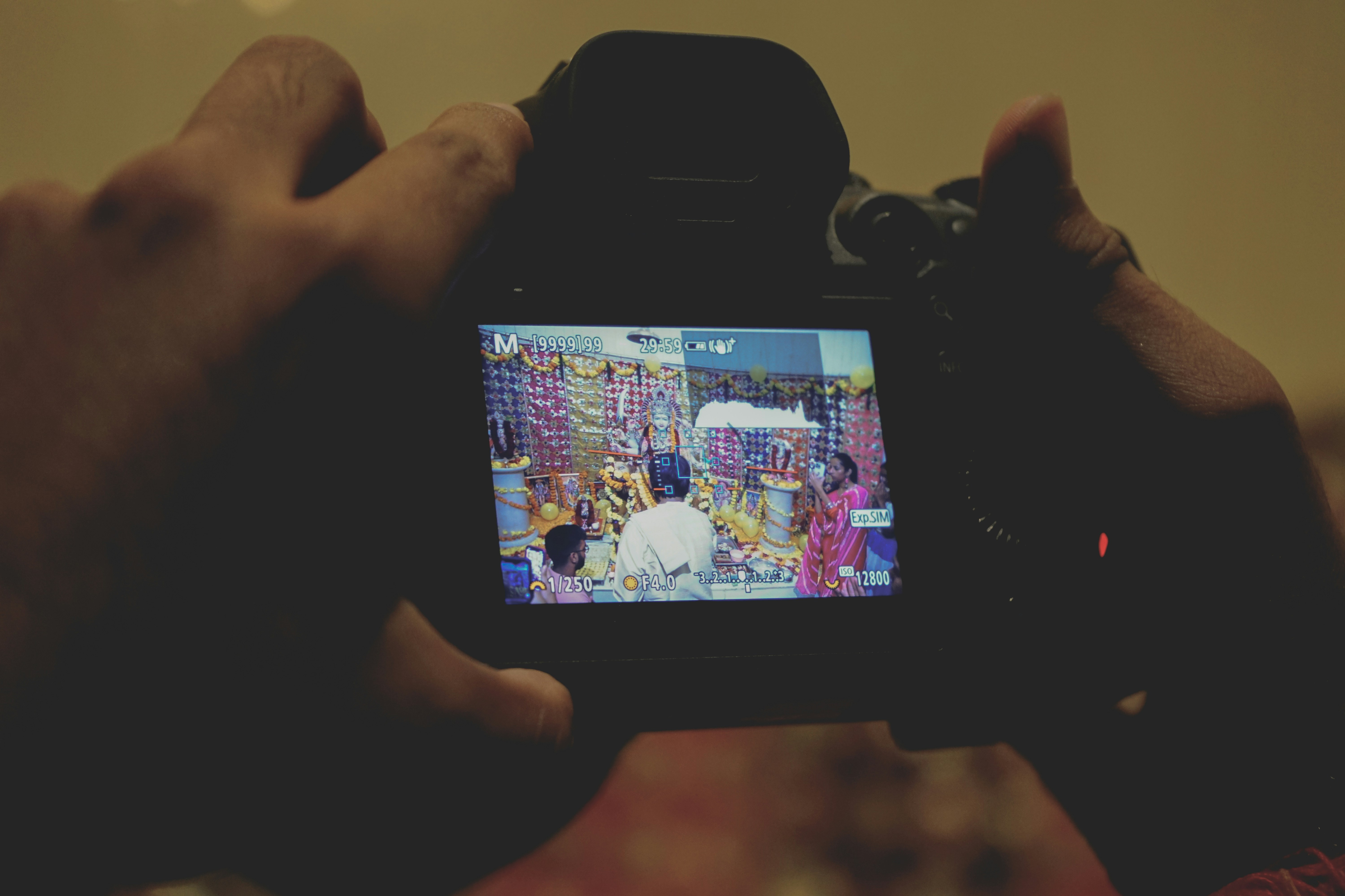 a person holding a camera