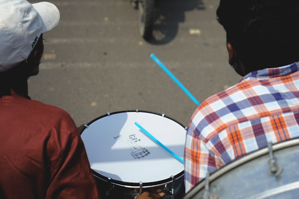 a man holding a blue object