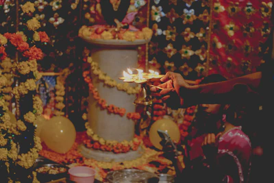 Morning aarti ceremony with glowing diyas and chanting priests.