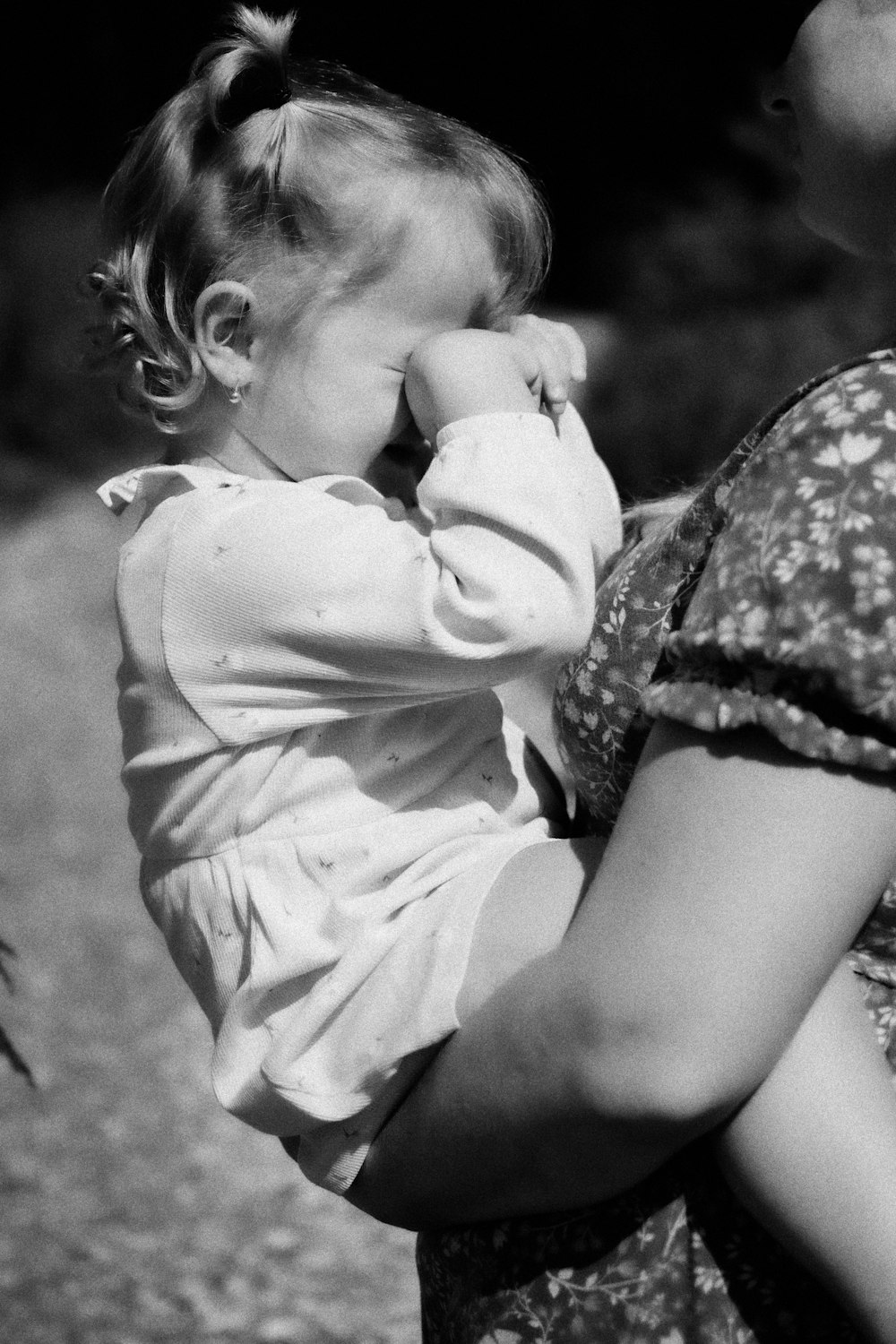 a person holding a baby