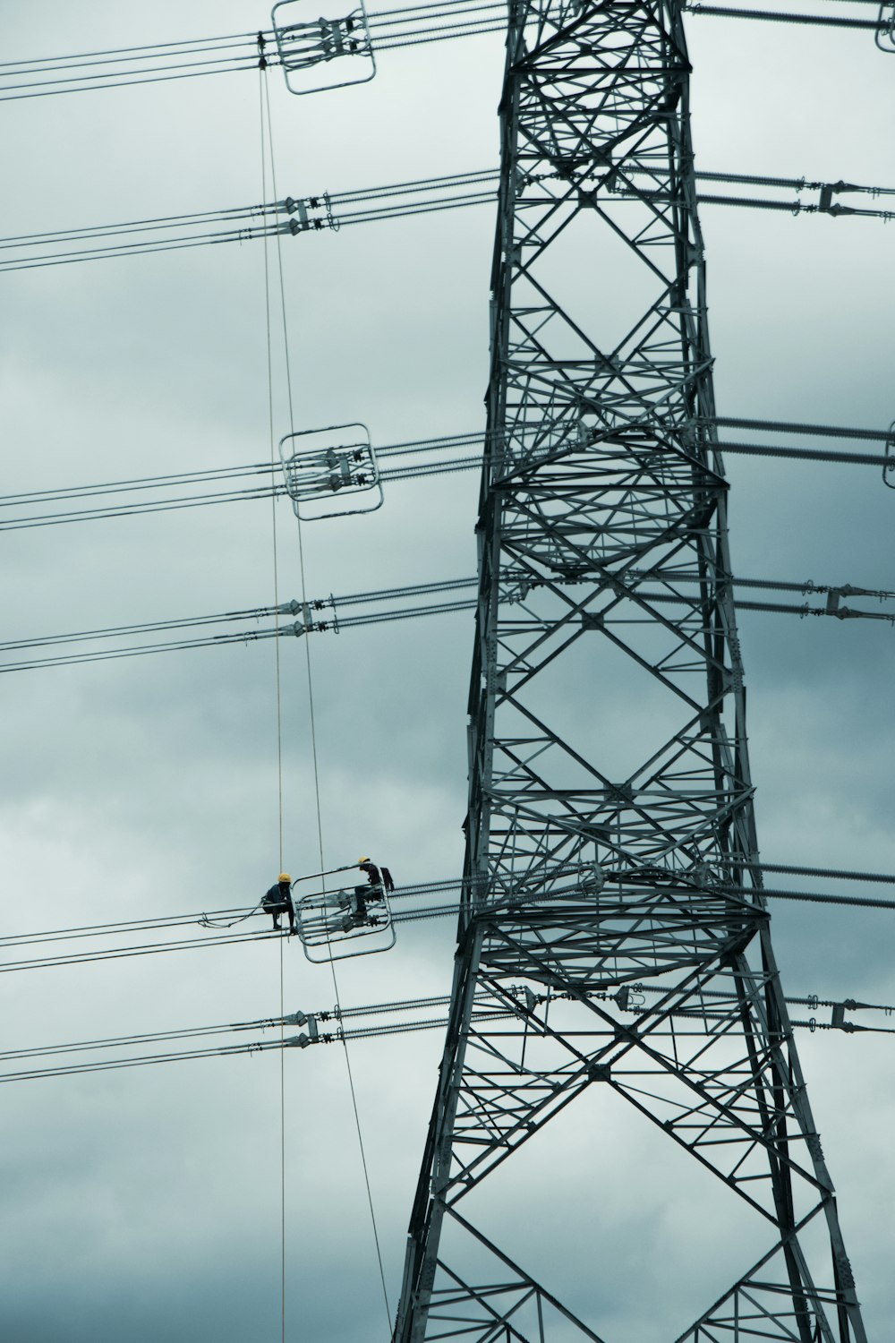 a group of people on a cable