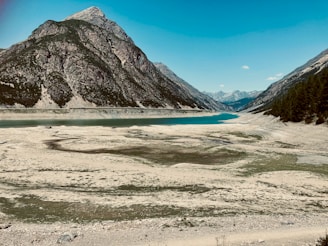 a lake in a snowy place