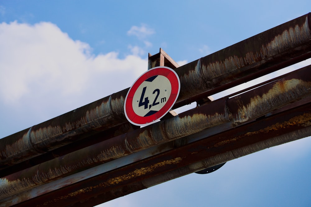 a sign on a bridge