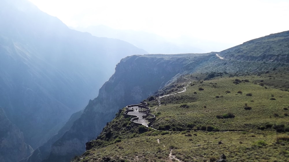 a valley with a stone wall