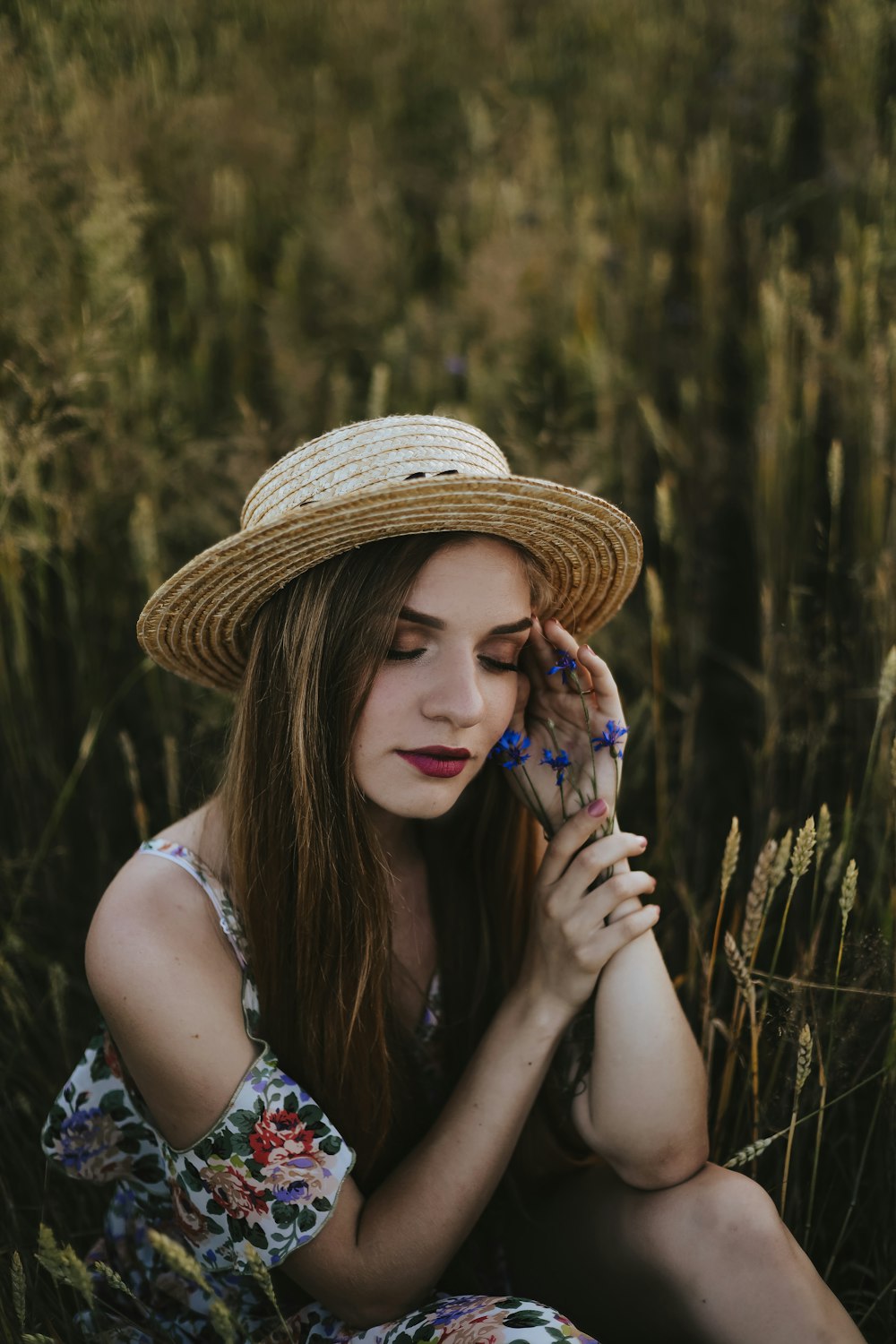 a woman wearing a straw hat