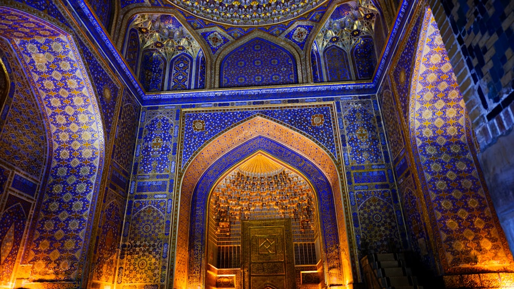 a large ornate ceiling with arched windows