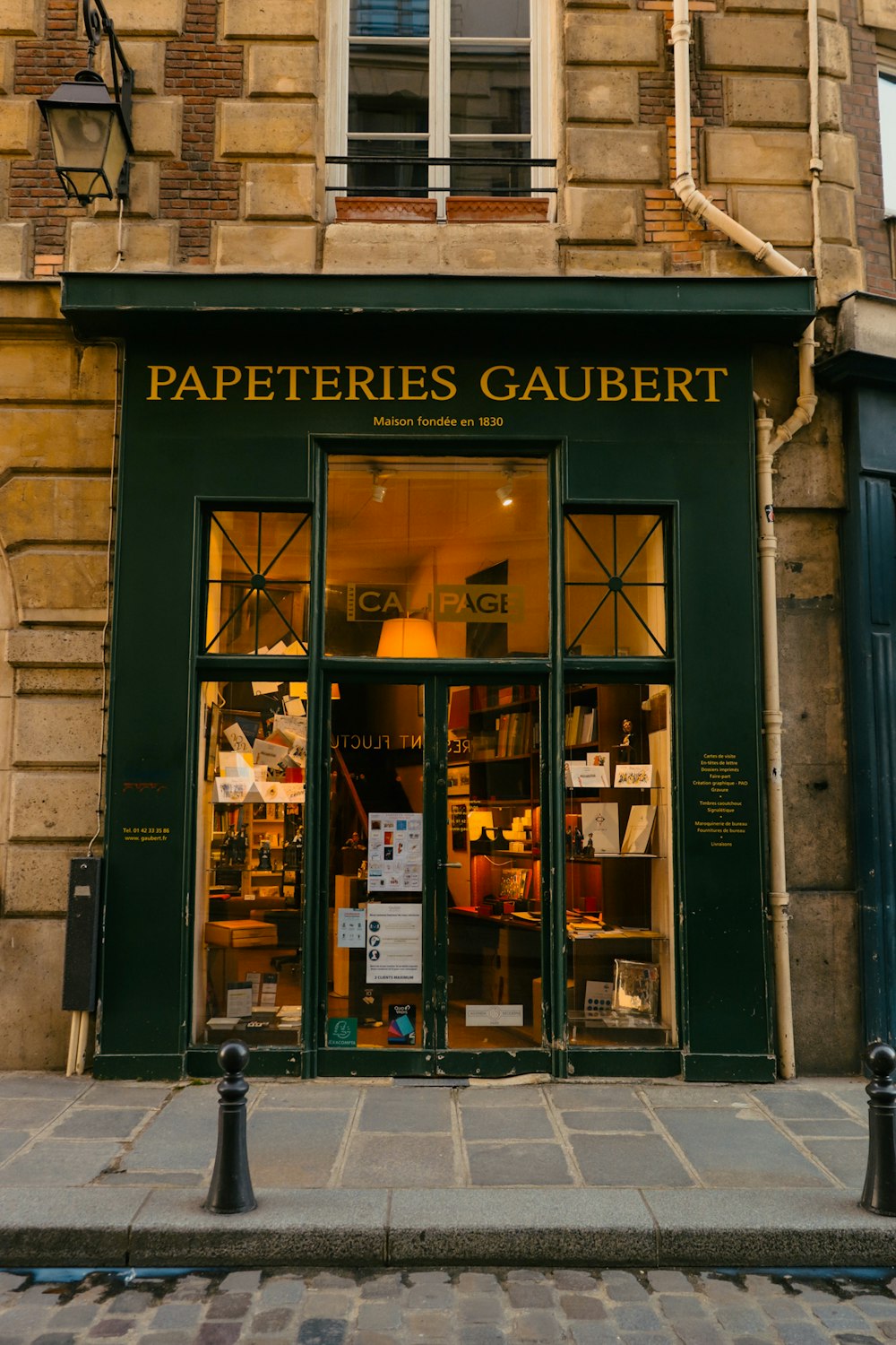 a store front with a sign on the window