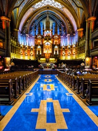 a large cathedral with blue and yellow tile floor