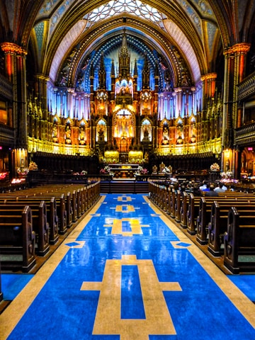 a large cathedral with blue and yellow tile floor