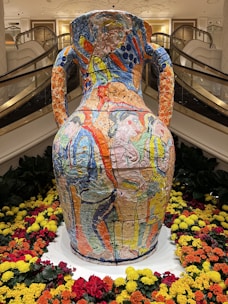 Sophisticated decorative sculptures and vases displayed in a high-end hotel lobby.