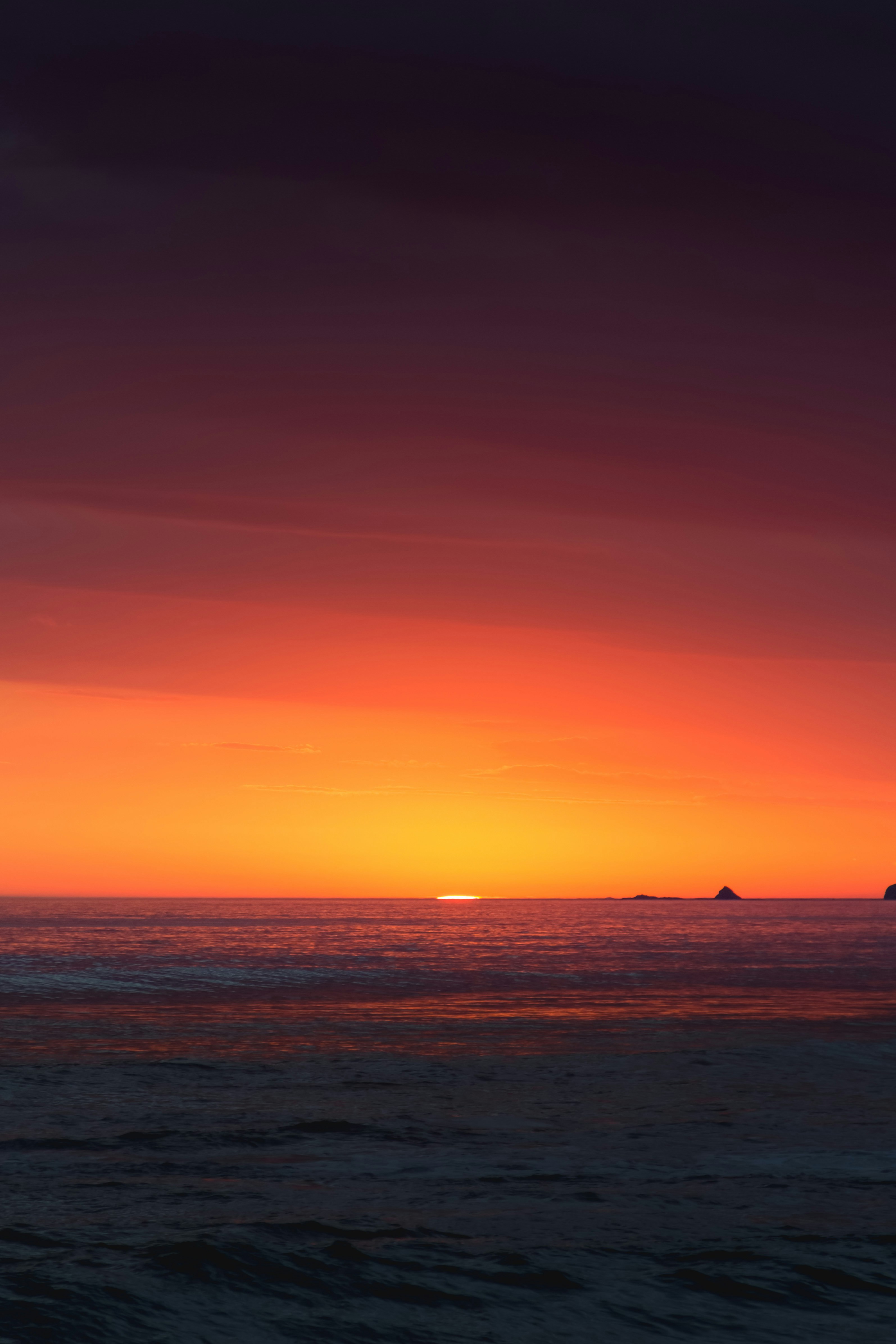 a sunset over the ocean