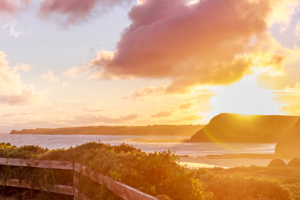 a sunset over a beach