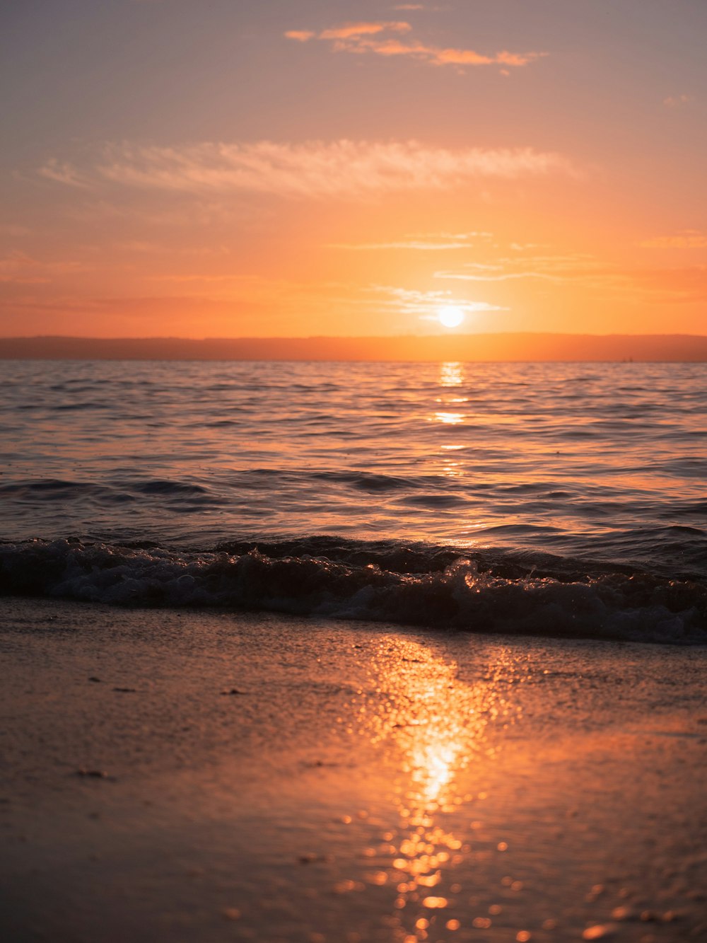 a sunset over the ocean