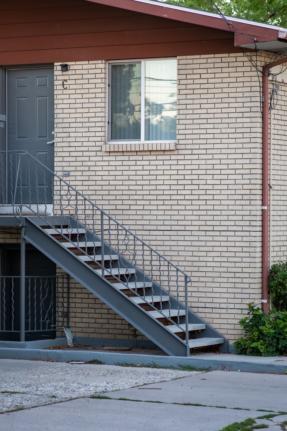 a brick building with a staircase